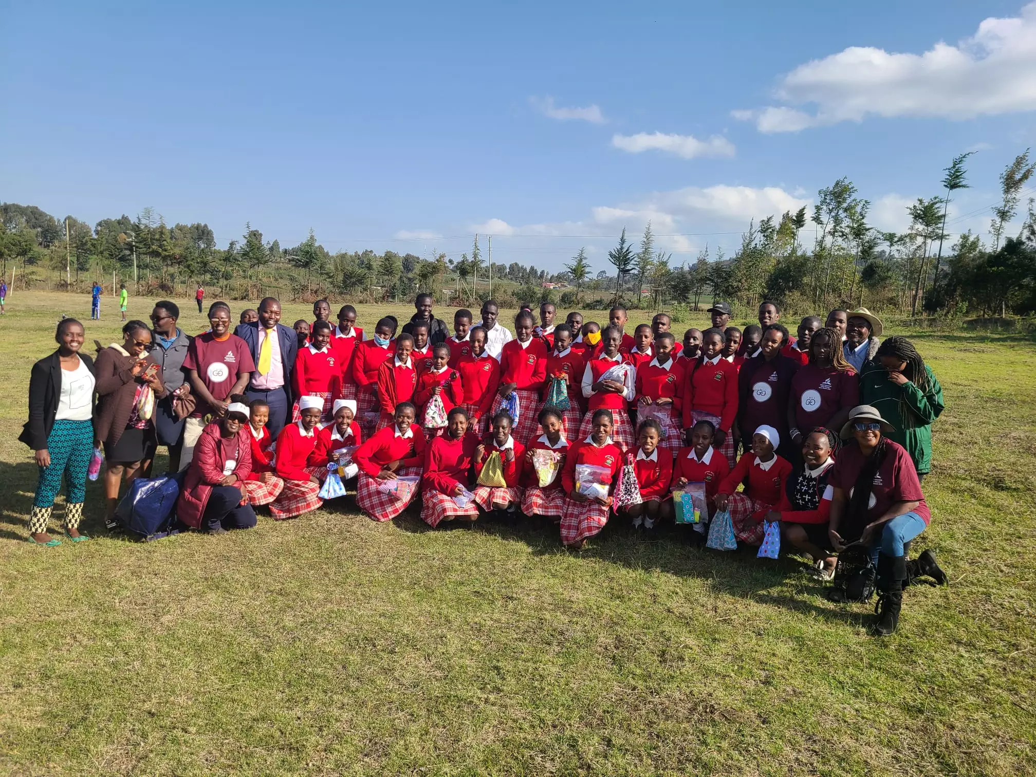 Volunteers engaging students during school visits